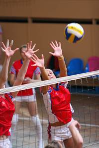 Photo 1: teenagers playing volleyball