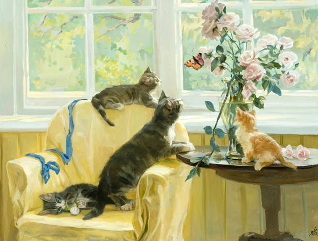 Кошки и котёнок в комнате у окна